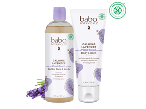 Babo Botanicals Calming Lavender bubble bath wash and body lotion on a black background