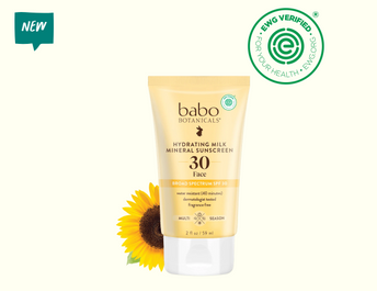 Sunscreen bottle with New and EWG Verified symbols