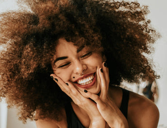 Woman brushing her long hair