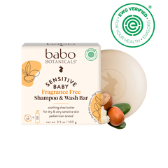 Babo Botanicals sensitive baby shampoo and wash bar with packaging on a black background