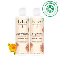 Two bottles of babo Botanicals shampoo and wash with a black background