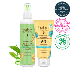 Babo Botanicals sun care products with awards on a black background